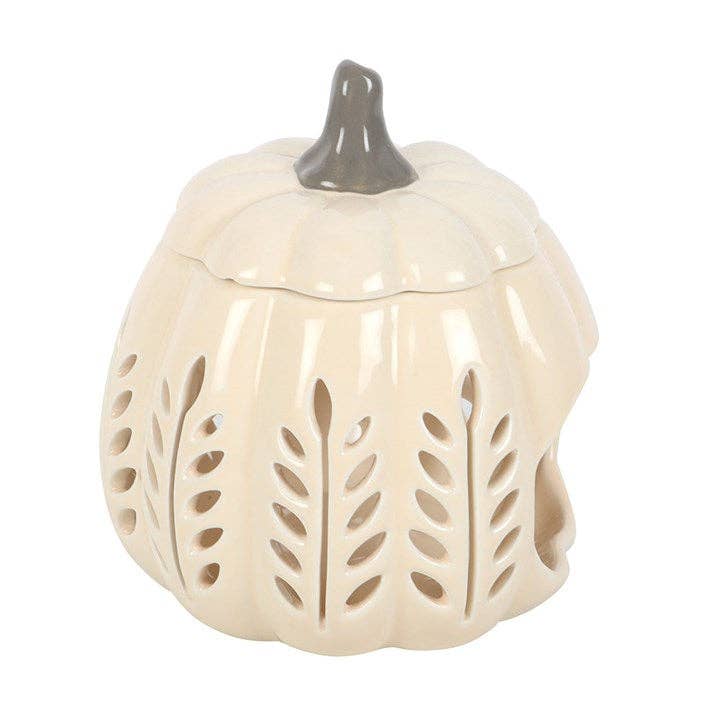 Brûleur d'huile et chauffe-cire en forme de feuille d'automne découpée en crème et citrouille.