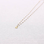 Collier en acier émaillé avec pendentif étoile: Noir