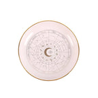 Plat à babioles en forme de roue astrologique blanc cassé