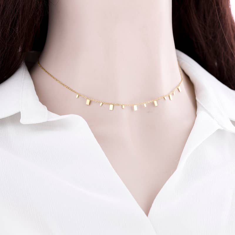 Collier en acier et pendentifs rectangulaires: Or