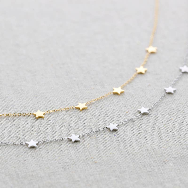Collier en acier à neuf petites étoiles: Or
