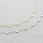 Collier en acier à neuf petites étoiles: Or