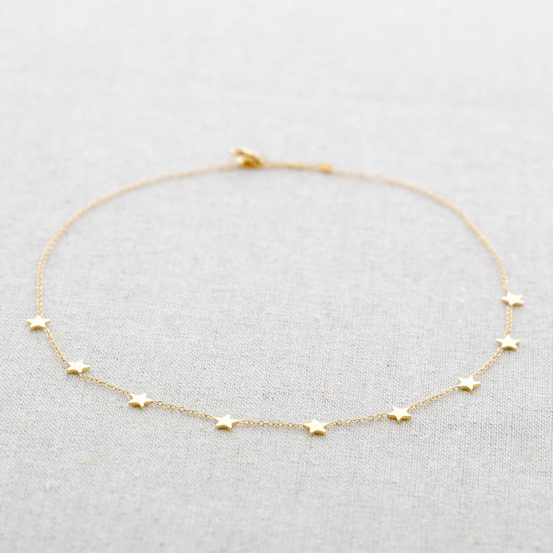 Collier en acier à neuf petites étoiles: Or