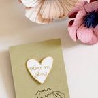 Épinglette « Viens on sème » en laiton