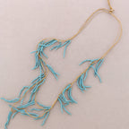 Long collier perlé en résine: Rouge