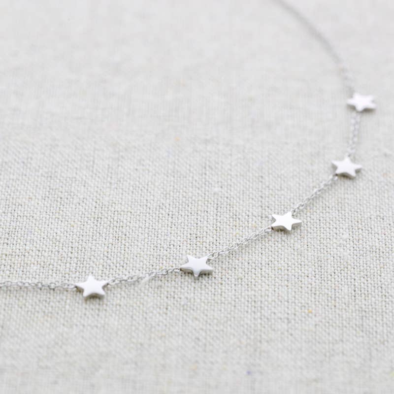 Collier en acier à neuf petites étoiles: Or