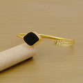 Bracelet ajustable en laiton plaqué or avec tourmaline noire brute