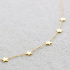 Collier en acier à neuf petites étoiles: Or