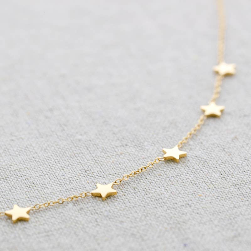Collier en acier à neuf petites étoiles: Or