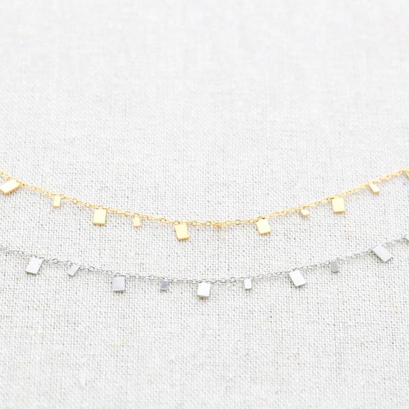 Collier en acier et pendentifs rectangulaires: Or