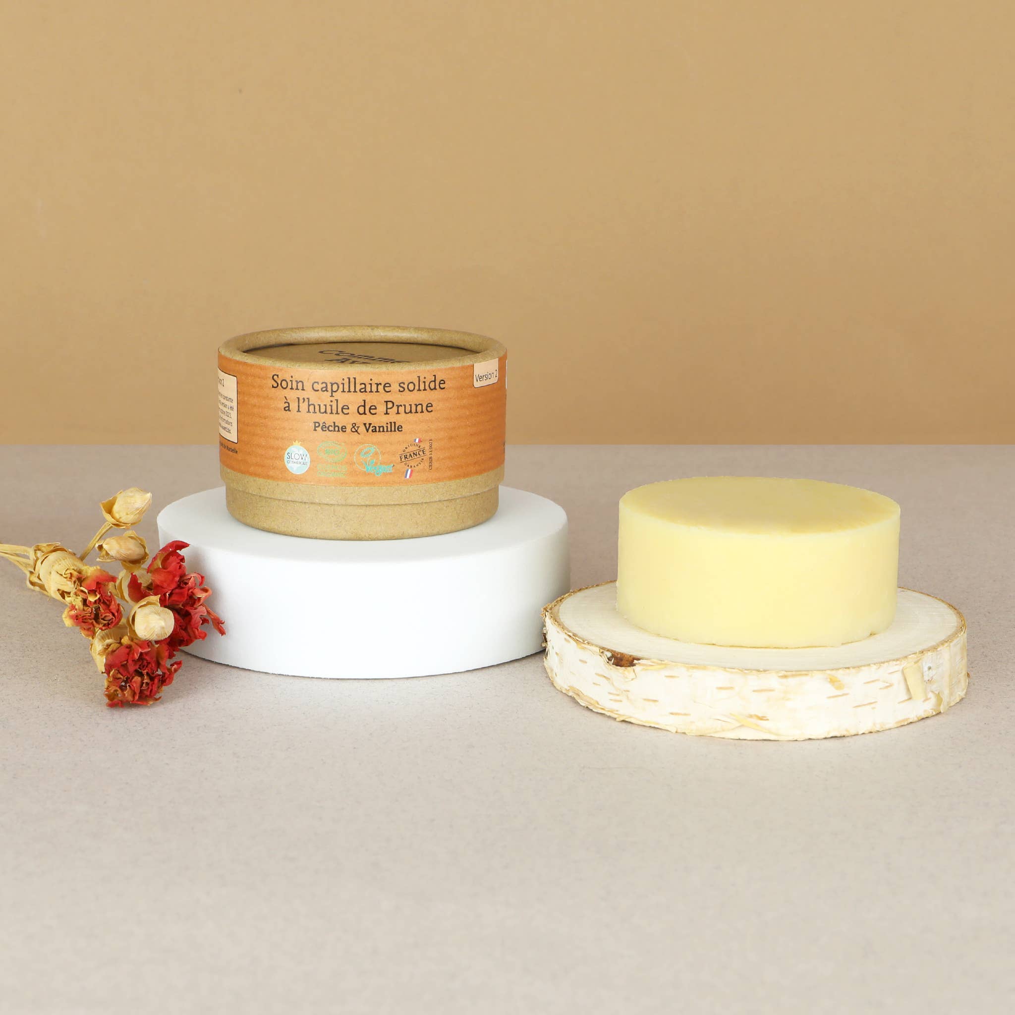 Soin capillaire solide à l'huile de prune bio: Pêche & Vanille
